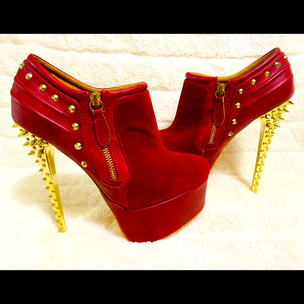 Red spiked high heel booties